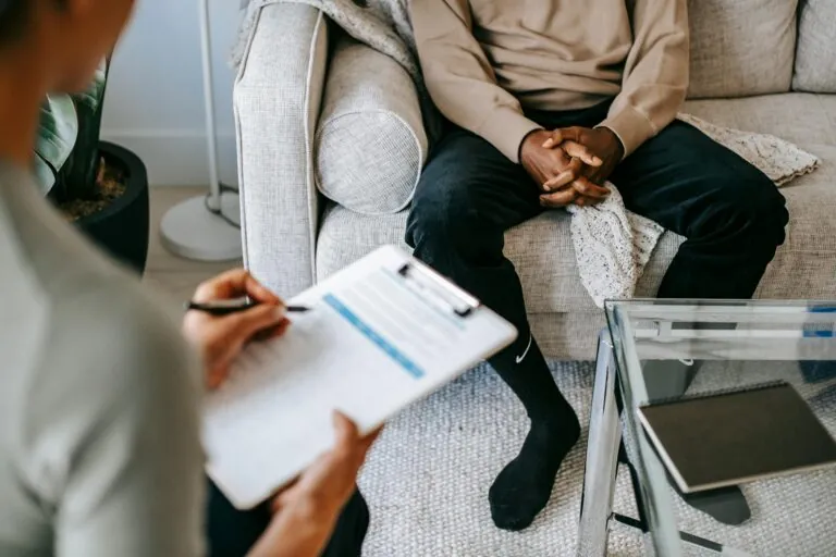 therapist and client in therapy room